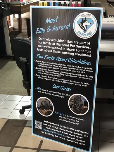 Tall printed information panel standing on a shop floor