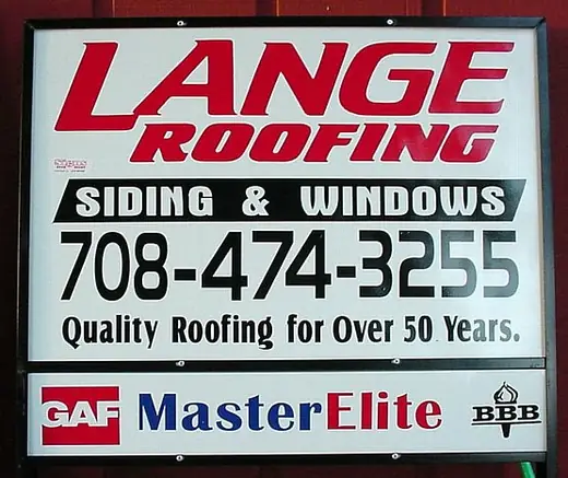 Red and white roofing and siding contractor sign